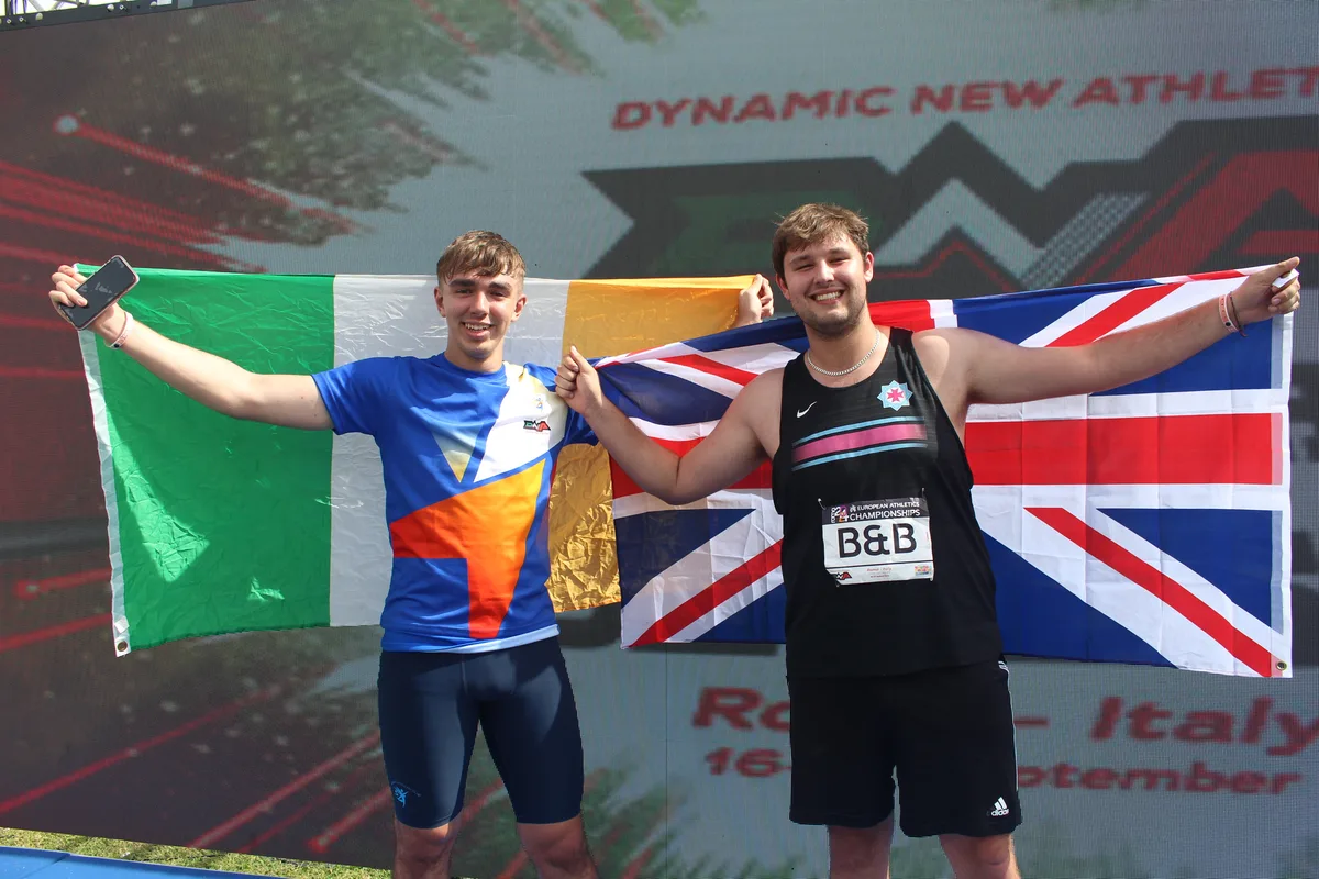 Brydon Duncan with Liam Shaw, holding the Union flag at the European Athletics U20 Club Championships in Rome